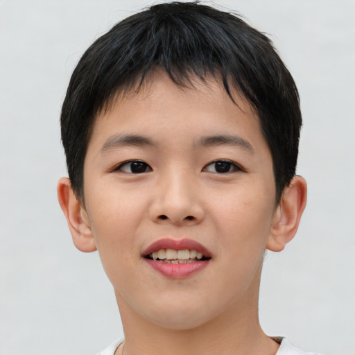 Joyful asian child female with short  brown hair and brown eyes