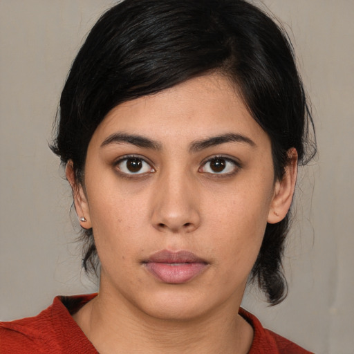 Neutral white young-adult female with medium  black hair and brown eyes