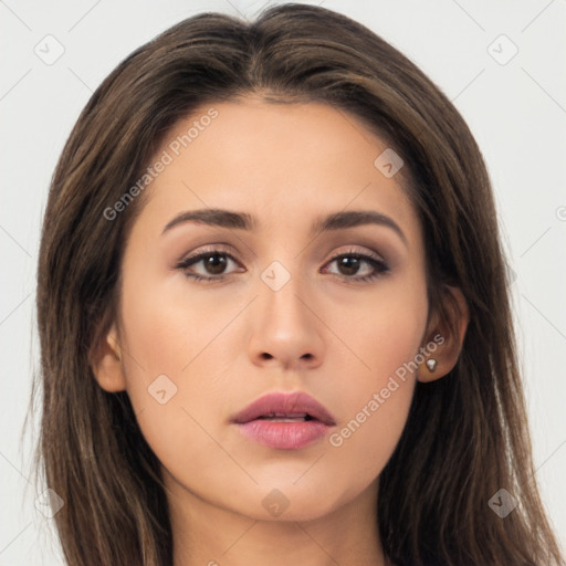 Neutral white young-adult female with long  brown hair and brown eyes