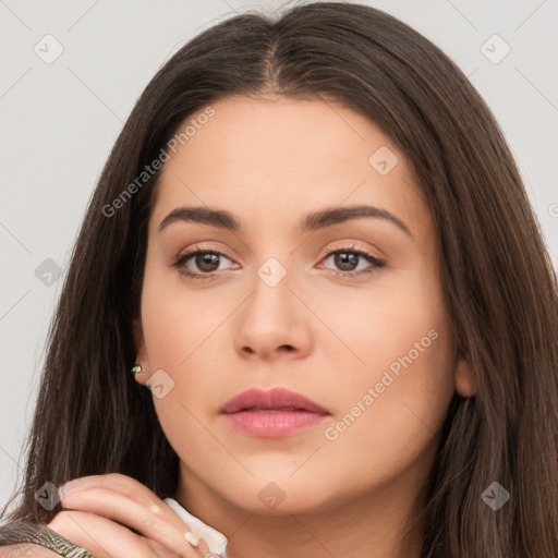 Neutral white young-adult female with long  brown hair and brown eyes