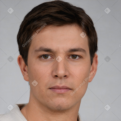 Neutral white young-adult male with short  brown hair and brown eyes