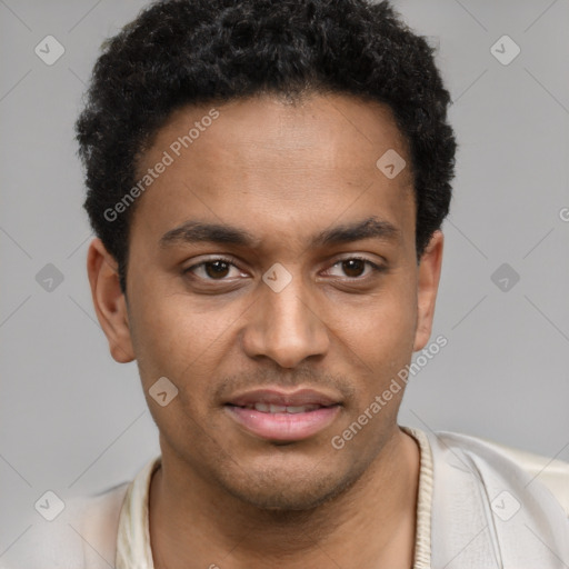 Joyful black young-adult male with short  brown hair and brown eyes