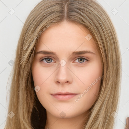 Neutral white young-adult female with long  brown hair and brown eyes