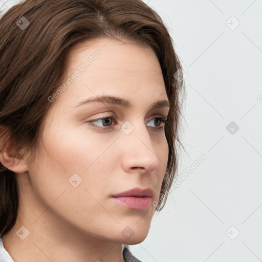 Neutral white young-adult female with medium  brown hair and grey eyes