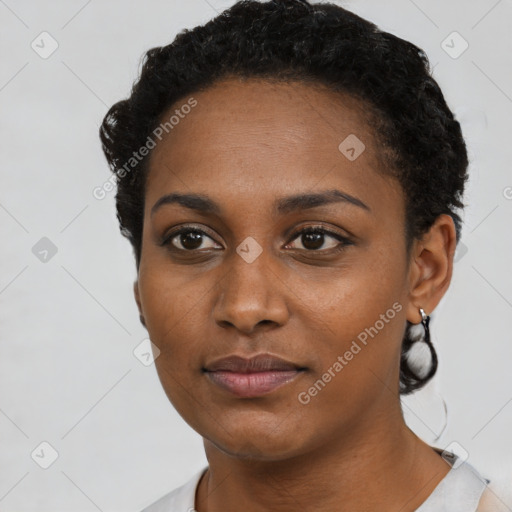 Neutral black young-adult female with short  black hair and brown eyes