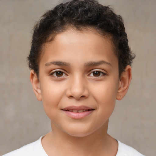 Joyful white child male with short  brown hair and brown eyes