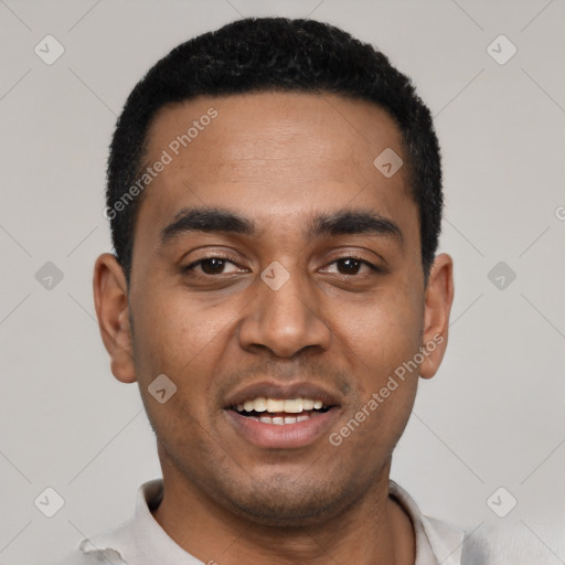 Joyful black young-adult male with short  black hair and brown eyes