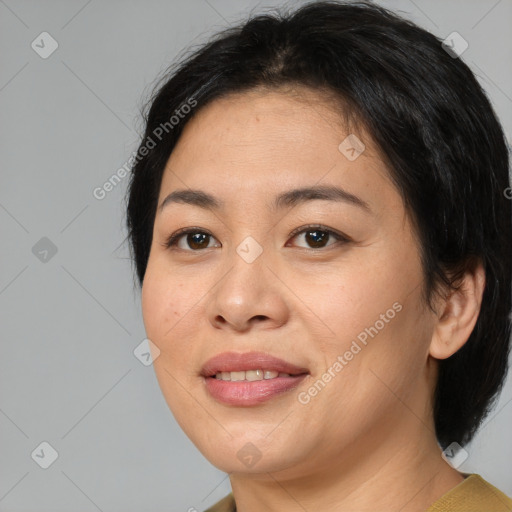 Joyful asian young-adult female with medium  brown hair and brown eyes