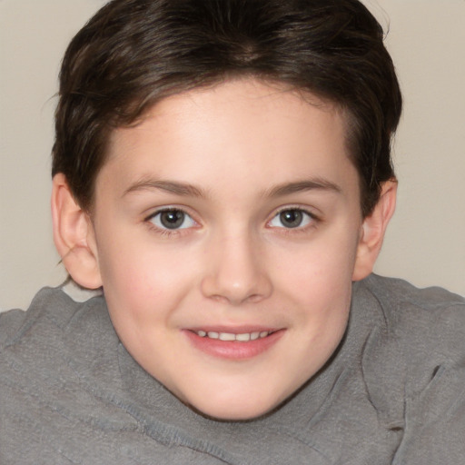 Joyful white child female with short  brown hair and brown eyes