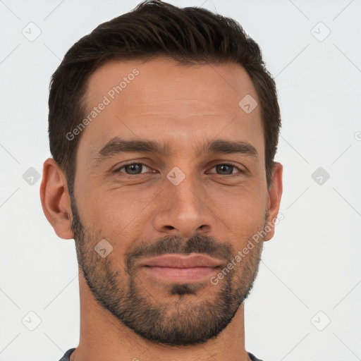 Joyful white young-adult male with short  brown hair and brown eyes