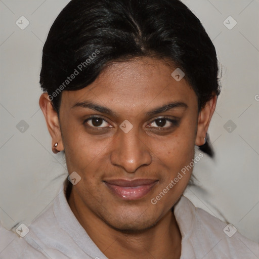 Joyful black young-adult female with short  brown hair and brown eyes