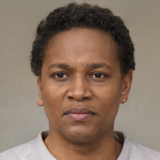 Neutral black adult female with short  black hair and brown eyes