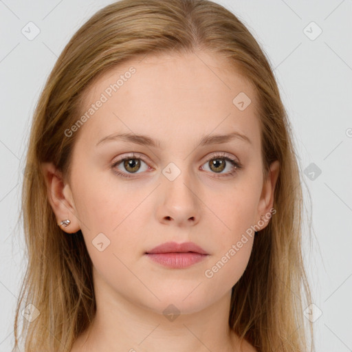 Neutral white young-adult female with long  brown hair and brown eyes