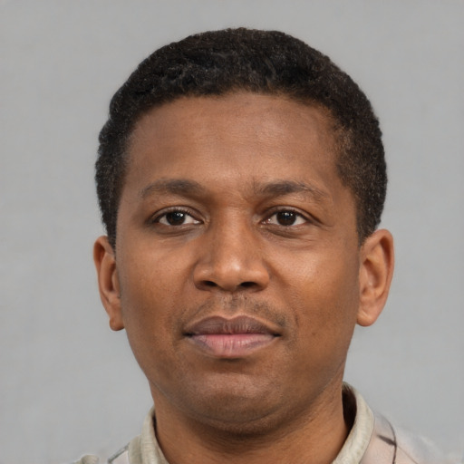 Neutral latino young-adult male with short  brown hair and brown eyes