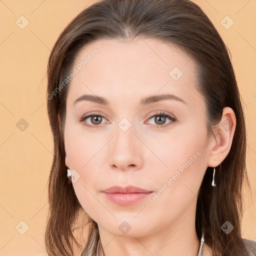 Neutral white young-adult female with long  brown hair and brown eyes