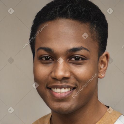 Joyful black young-adult female with short  black hair and brown eyes