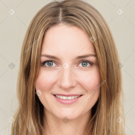 Joyful white young-adult female with long  brown hair and green eyes