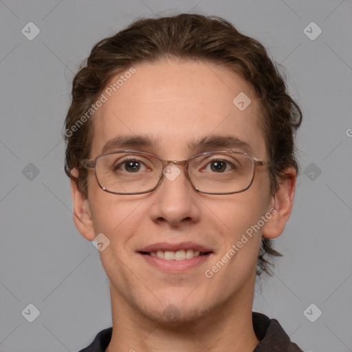 Joyful white adult male with short  brown hair and grey eyes