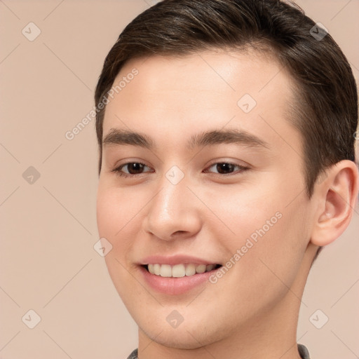 Joyful white young-adult male with short  brown hair and brown eyes