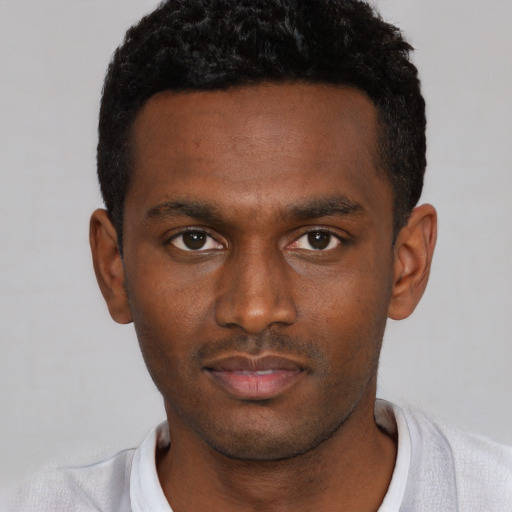 Neutral black young-adult male with short  black hair and brown eyes