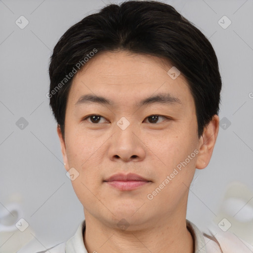 Neutral asian young-adult male with short  black hair and brown eyes