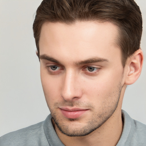 Neutral white young-adult male with short  brown hair and brown eyes