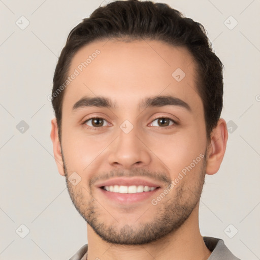 Joyful white young-adult male with short  brown hair and brown eyes