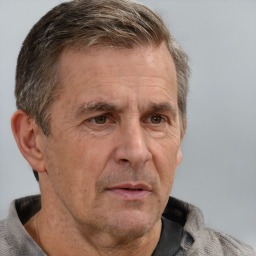 Neutral white middle-aged male with short  brown hair and grey eyes