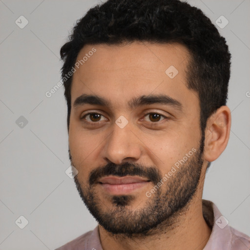 Joyful latino young-adult male with short  black hair and brown eyes