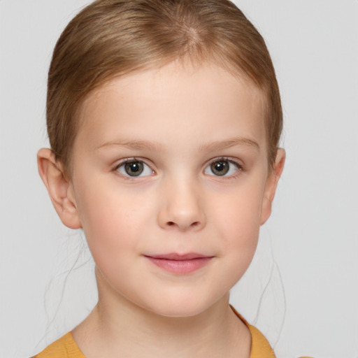 Joyful white child female with short  brown hair and brown eyes