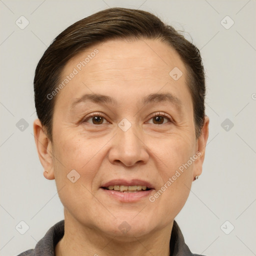 Joyful white adult female with short  brown hair and brown eyes