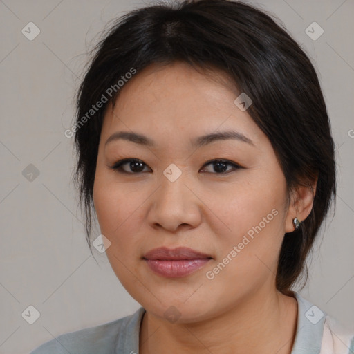 Joyful asian young-adult female with medium  brown hair and brown eyes