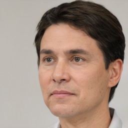 Neutral white adult male with short  brown hair and brown eyes