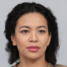 Neutral asian young-adult female with medium  brown hair and brown eyes