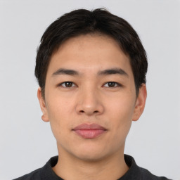 Neutral asian young-adult male with short  brown hair and brown eyes