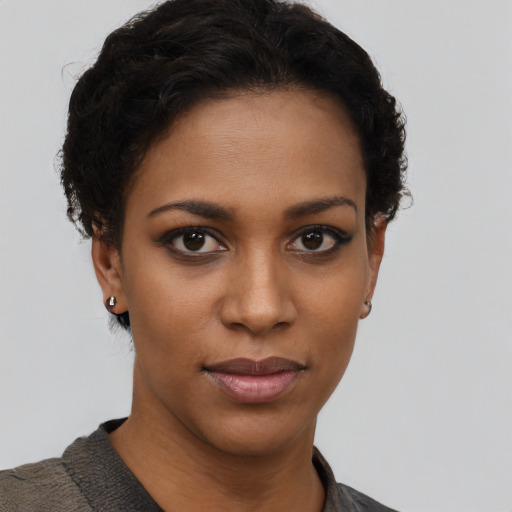 Neutral black young-adult female with short  brown hair and brown eyes