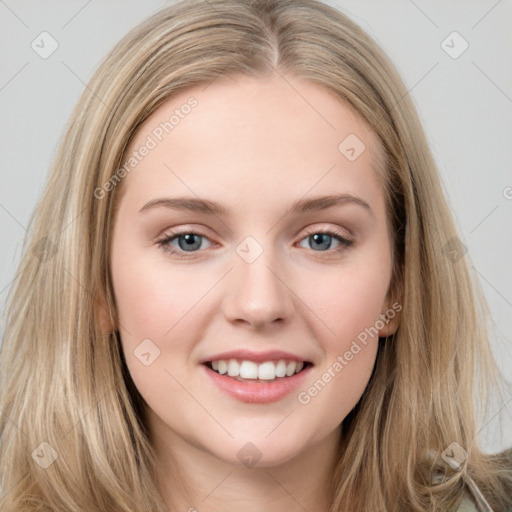 Joyful white young-adult female with long  brown hair and grey eyes