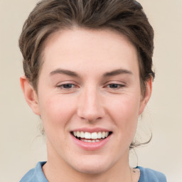 Joyful white young-adult female with medium  brown hair and green eyes