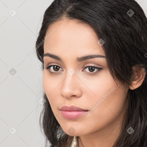 Neutral latino young-adult female with long  black hair and brown eyes