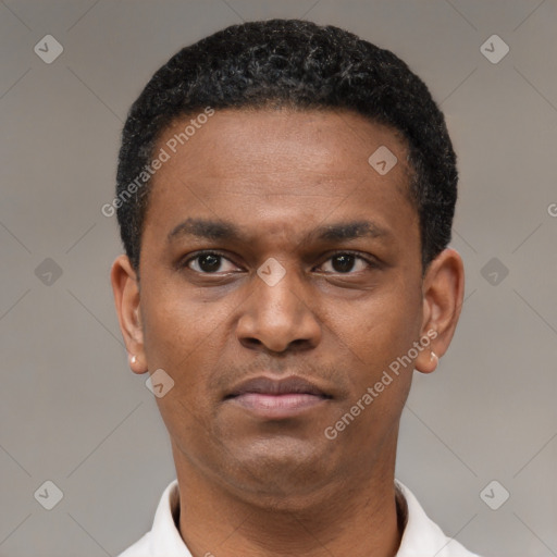Neutral latino young-adult male with short  black hair and brown eyes