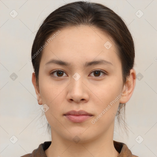 Neutral white young-adult female with short  brown hair and brown eyes