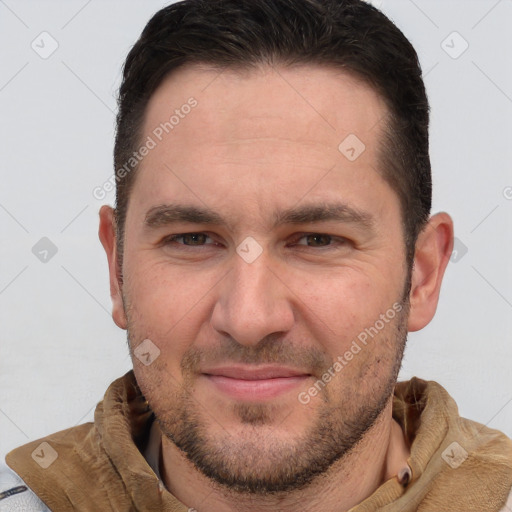 Joyful white young-adult male with short  brown hair and brown eyes