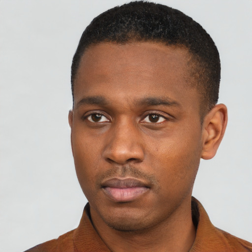 Neutral black young-adult male with short  black hair and brown eyes