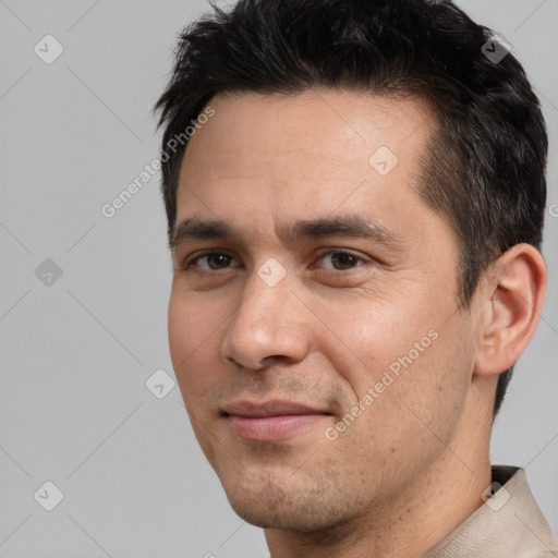 Joyful white adult male with short  brown hair and brown eyes