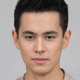 Neutral asian young-adult male with short  brown hair and brown eyes