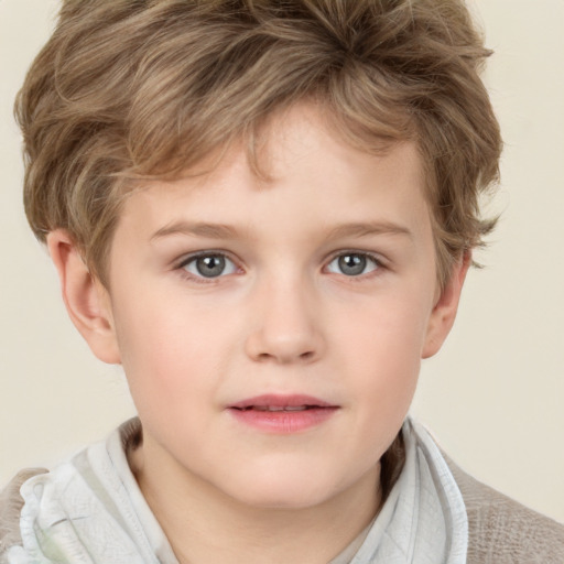 Joyful white child male with short  brown hair and grey eyes