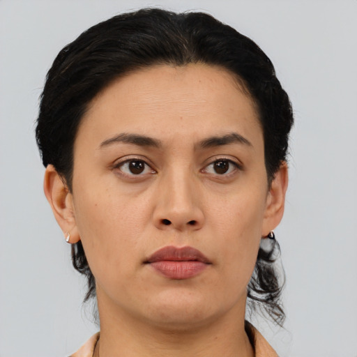 Neutral asian young-adult female with short  brown hair and brown eyes