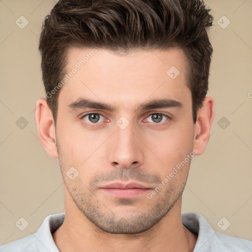 Neutral white young-adult male with short  brown hair and brown eyes