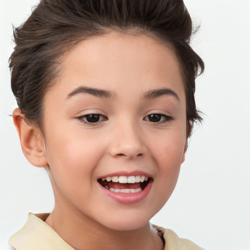 Joyful white child female with short  brown hair and brown eyes