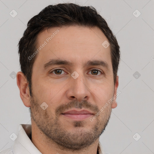 Joyful white adult male with short  brown hair and brown eyes